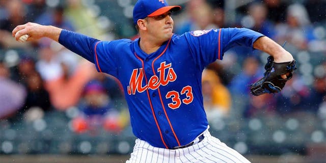 Jun 27, 2015; New York City, NY, USA; New York Mets starting pitcher Matt Harvey (33) pitches against the Cincinnati Reds during the second inning at Citi Field. Mandatory Credit: Brad Penner-USA TODAY Sports