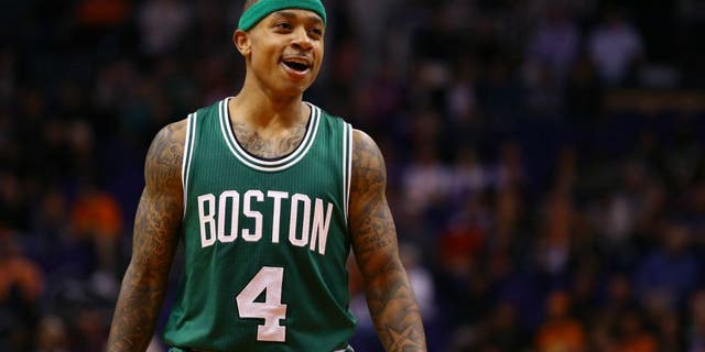 Feb 23, 2015; Phoenix, AZ, USA; Boston Celtics guard Isaiah Thomas reacts in the fourth quarter against the Phoenix Suns at US Airways Center. The Celtics defeats the Suns 115-110. Mandatory Credit: Mark J. Rebilas-USA TODAY Sports