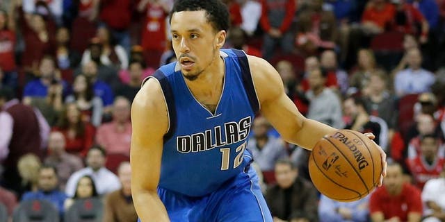 Jan 24, 2016; Houston, TX, USA; Dallas Mavericks guard John Jenkins (12) dribbles against the Houston Rockets at Toyota Center. Mandatory Credit: Thomas B. Shea-USA TODAY Sports