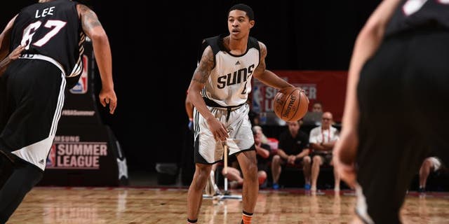 LAS VEGAS, NV - JULY 12: Tyler Ulis #8 of the Phoenix Suns handles the ball against the Miami Heat during the 2016 NBA Las Vegas Summer League on July 12, 2016 at The Thomas &amp; Mack Center in Las Vegas, Nevada. NOTE TO USER: User expressly acknowledges and agrees that, by downloading and or using this photograph, user is consenting to the terms and conditions of Getty Images License Agreement. Mandatory Copyright Notice: Copyright 2016 NBAE (Photo by Garrett Ellwood/NBAE via Getty Images)