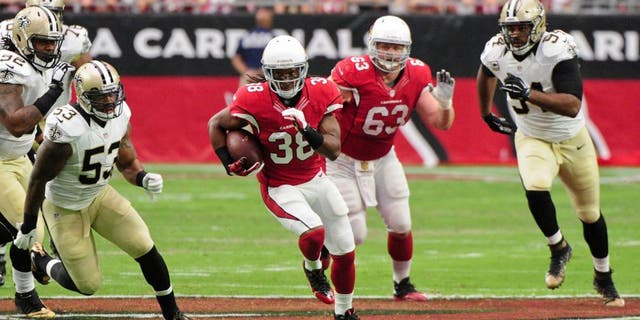 Sep 13, 2015; Glendale, AZ, USA; Arizona Cardinals running back Andre Ellington (38) carries the ball during the first half against the Arizona Cardinals at University of Phoenix Stadium. Mandatory Credit: Matt Kartozian-USA TODAY Sports