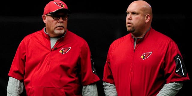Aug 1, 2015; Glendale, AZ, USA; Arizona Cardinals head coach Bruce Arians and General Manager Steve Keim look on during training camp at University of Phoenix. Mandatory Credit: Matt Kartozian-USA TODAY Sports