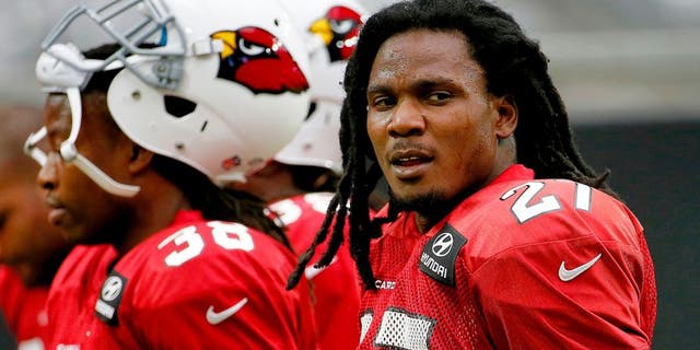Arizona Cardinals running back Chris Johnson participates in an NFL football training camp, Tuesday, Aug. 18, 2015, in Glendale, Ariz. (AP Photo/Matt York)