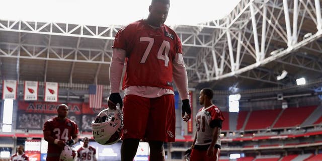 GLENDALE, AZ - AUGUST 02: Offensive tackle D.J. Humphries #74 of the Arizona Cardinals walks off the field following the team training camp at University of Phoenix Stadium on August 2, 2015 in Glendale, Arizona. (Photo by Christian Petersen/Getty Images)