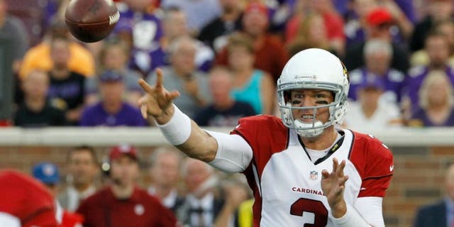 Arizona Cardinals quarterback Carson Palmer throws a pass during the first half of an NFL preseason football game against the Minnesota Vikings, Saturday, Aug. 16, 2014, in Minneapolis. (AP Photo/Ann Heisenfelt)