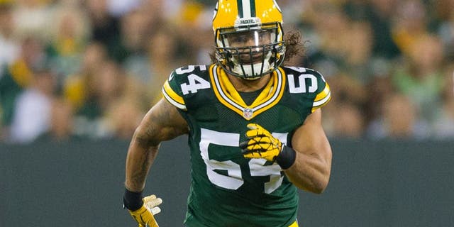 Aug 22, 2014; Green Bay, WI, USA; Green Bay Packers linebacker Carl Bradford (54) during the game against the Oakland Raiders at Lambeau Field. Mandatory Credit: Jeff Hanisch-USA TODAY Sports