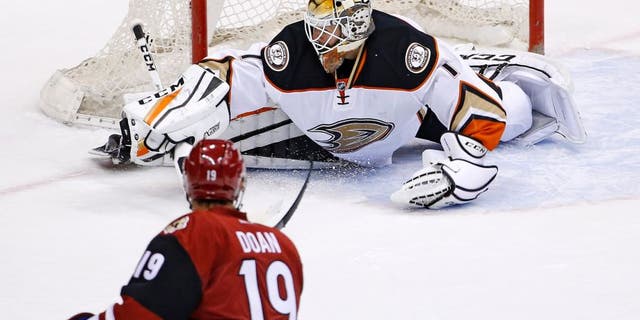 Arizona Coyotes' Shane Doan (19) scores the game-winning goal against Anaheim Ducks goalie Jonathan Bernier (1) during overtime of a preseason NHL hockey game Saturday, Oct. 1, 2016, in Glendale, Ariz. The Coyotes defeated the Ducks 3-2. (AP Photo/Ross D. Franklin)