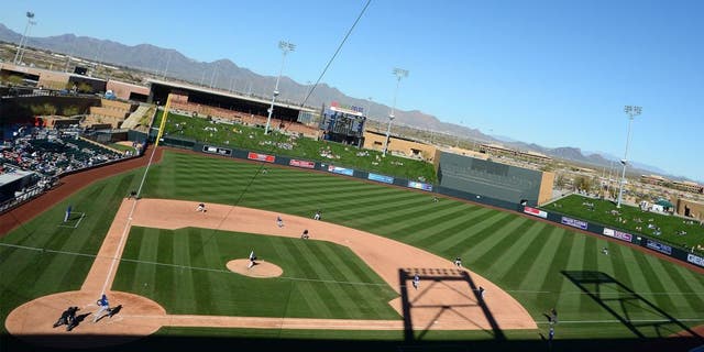 Feb 25, 2013; Salt River Pima-Maricopa, AZ, USA; A general view of a game between the Texas Rangers and Colorado Rockies in the ninth inning at Salt River Fields at Talking Stick. Mandatory Credit: Jake Roth-USA TODAY Sports