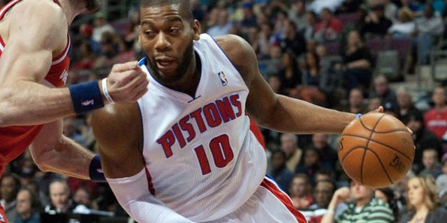Dec 30, 2013; Auburn Hills, MI, USA; Detroit Pistons power forward Greg Monroe (10) drives to the basket against the Washington Wizards during the first quarter at The Palace of Auburn Hills. Mandatory Credit: Tim Fuller-USA TODAY Sports