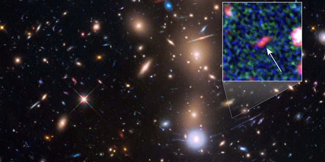 This is a Hubble Space Telescope view of a very massive cluster of galaxies, MACS J0416.1-2403, located roughly 4 billion light-years away and weighing as much as a million billion suns.