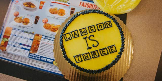 Lawson's birthday cake was made to look like the Waffle House logo.