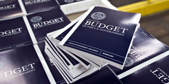 April 8, 2013: Copies of President Obama's budget plan for fiscal year 2014 are prepared for delivery at the U.S. Government Printing Office in Washington.