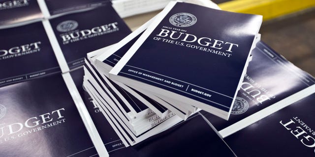 April 8, 2013: Copies of President Obama's budget plan for fiscal year 2014 are prepared for delivery at the U.S. Government Printing Office in Washington.