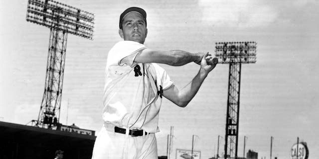 In this June 4, 1952, file photo, Jim Piersall of the Boston Red Sox poses at Fenway Park in Boston, Ma., before a game against the Cleveland Indians.