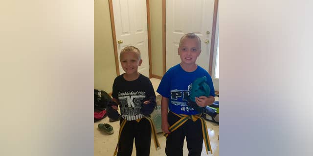 Gavin,9, and his brother Gage, 6, in June 2015.