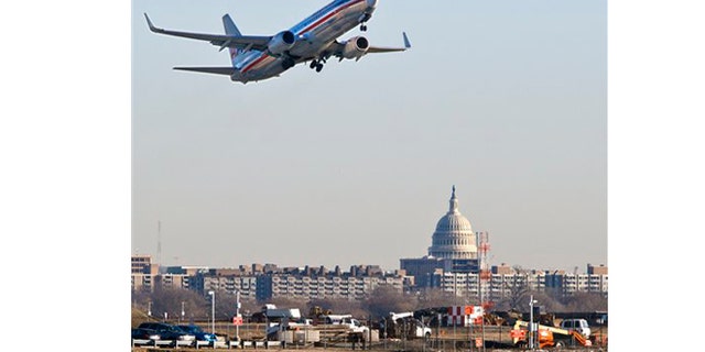 Feb. 23, 2012: An American Airlines jet takes off from Reagan National Airport in Washington.