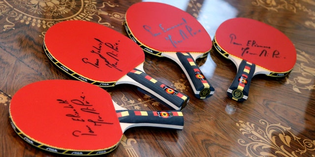 File photo - A set of bats offered to the children of King Philippe by former Belgian table tennis champion Jean-Michel Saive are pictured at Brussels' Royal Palace, Belgium, Jan. 5, 2016. (REUTERS/Francois Lenoir)