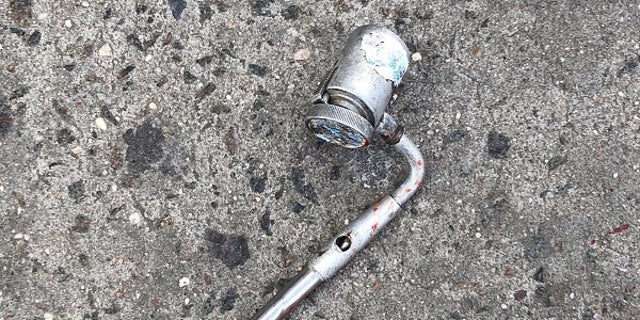 This photo shows the metal object police mistook for a firearm.
