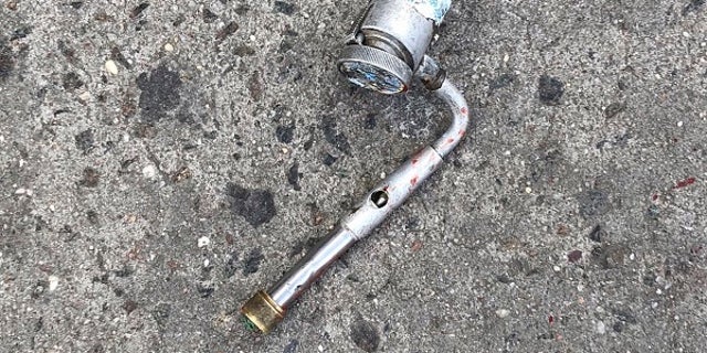 This photo shows the metal object police mistook for a firearm.