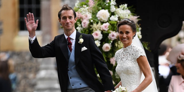 Pippa Middleton and her husband, James Matthews, smile following their wedding ceremony at St Mark's Church in Englefield, west of London, on May 20, 2017.