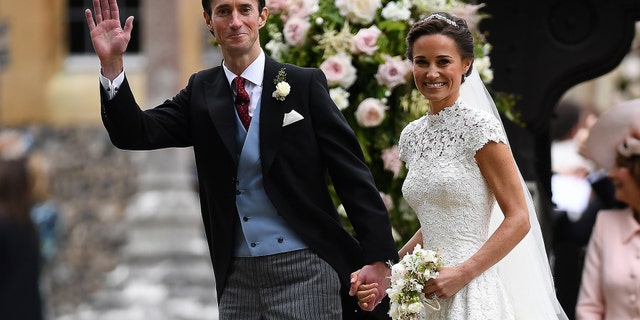 Pippa Middleton and her husband, James Matthews, smile following their wedding ceremony at St Mark's Church in Englefield, west of London, on May 20, 2017.