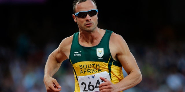 Sept. 5, 2012: In this file photo, South Africa' Oscar Pistorius competes during Men's 100m T44 round 1 at the 2012 Paralympics in London. A judge in South Africa says Pistorius, who is charged with murdering his girlfriend, can leave South Africa to compete in international competition, with conditions.