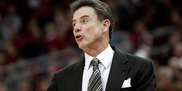 Dec. 18: Louisville coach Rick Pitino gives instructions to his team in their NCAA college basketball game against Gardner-Webb in Louisville, Ky. (AP)