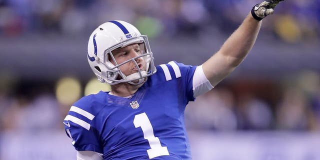 INDIANAPOLIS, IN - NOVEMBER 24: Pat McAfee #1 of the Indianapolis Colts reacts after throwing a first down pass on a trick play during the second quarter of the game against the Pittsburgh Steelers at Lucas Oil Stadium on November 24, 2016 in Indianapolis, Indiana. (Photo by Andy Lyons/Getty Images)