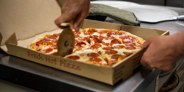 pizza box pizza cutter istock