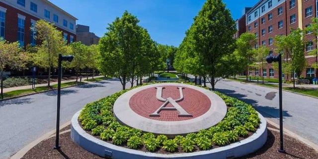 A college professor has been rebuked by his school after seeming to promise to raise some students' grades on account of their gender.