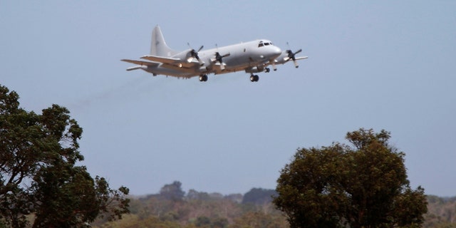 A Royal Australian Air Force P-3 Orion aircraft takes off from RAAF Base Pearce near Perth, to search for the missing Malaysia Airlines flight MH370 over the southern Indian Ocean, March 23, 2014.