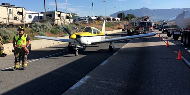 A single engine airplane experienced mechanical issues and reportedly lost power before landing on the I-15 in Utah.