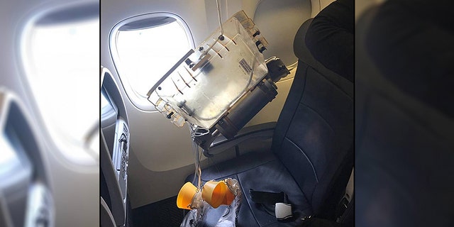 An oxygen canister fell from the ceiling of an American Airlines plane during landing, hitting a small child in the head.