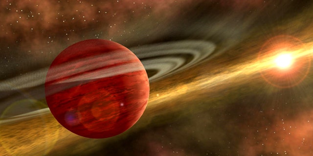 This artist's image shows a newly formed planet swimming through the gas and dust surrounding the star. Such a planet might scoop up gas and dust to build an atmosphere, which it could lose as it moves closer to its sun. Thus it could shift from a gas planet to a terrestrial planet.