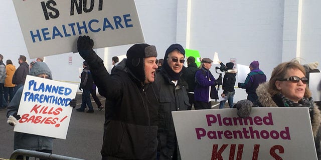 Abortion opponents rally outside Planned Parenthood in St. Paul, Minn., on Saturday.