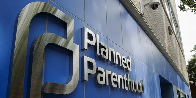 A sign is pictured at the entrance to a Planned Parenthood building in New York August 31, 2015. 