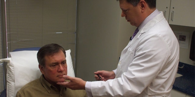 Plastic surgery patient Joe Marek and Stephen Baker, MD, an ASPS Member Surgeon.