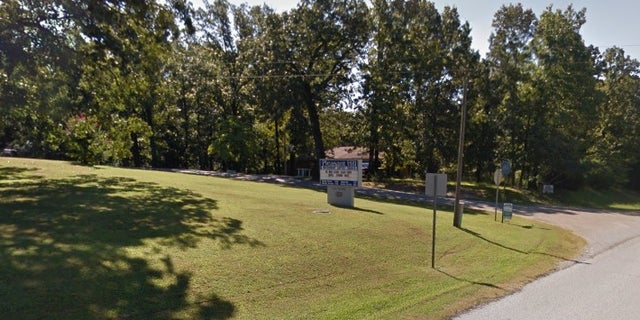 The cemetery was located near Pleasant Hill Missionary Baptist Church in Arkansas.