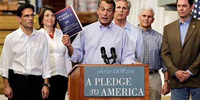 Thursday: House Minority Leader John Boehner of Ohio, center, holds up a copy of the GOP agenda, "A Pledge to America." Rep. Kevin McCarthy, R-Calif., who appeared with Boehner on "Fox News Sunday," stands behind Boehner's left shoulder.