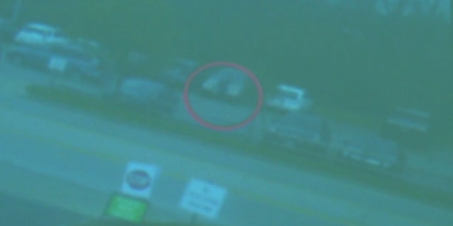 Kyle Plush is seen in surveillance video getting into his minivan on April 10, the day he was crushed in the backseat.