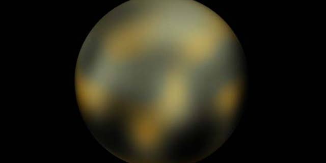 Dwarf planet Pluto is seen in an image taken by the Hubble Space Telescope.