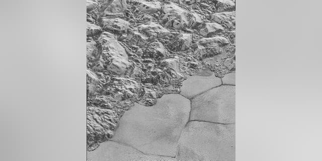 This image from NASA's New Horizons spacecraft shows sections of Pluto's water-ice crust (NASA)