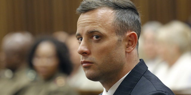 Oscar Pistorius looked downward as Steenkamp testified.
