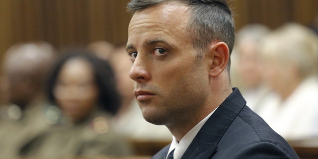 Oscar Pistorius looked downward as Steenkamp testified.