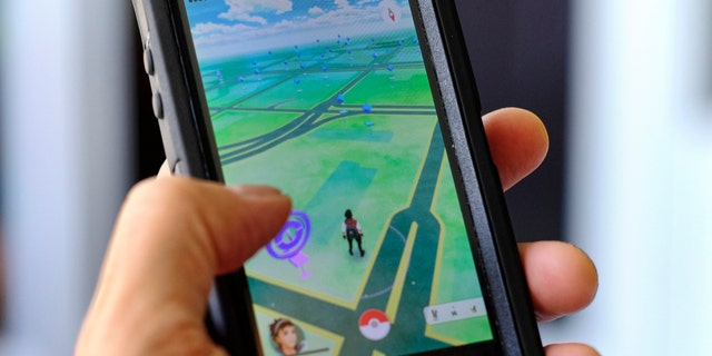 Pokemon Go is displayed on a cell phone in Los Angeles on Friday, July 8, 2016.