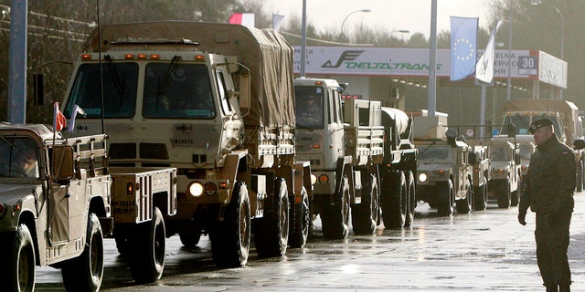 In this file photo taken Jan. 12, 2017, welcomed in Zagan, Poland, first U.S. troops are arriving at the Zagan base in western Poland as part of deterrence force of some 1,000 troops to be based here and reassure Poland that is worried about Russia's activity.