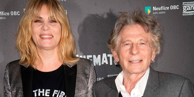 French-Polish director Roman Polanski poses with actress Emmanuelle Seigner during a photocall for his latest film, 'Based on a True Story' at the Cinematheque in Paris. French feminists will stage a protest against Polanski, who was accused of a string of sexual assaults several years ago. October 30, 2017 X17online.com USA ONLY