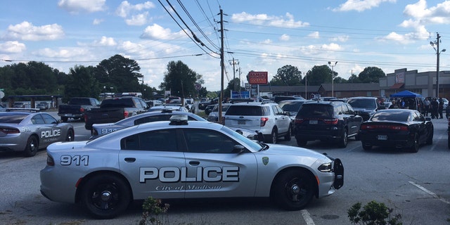 Police searching in Madison, GA.