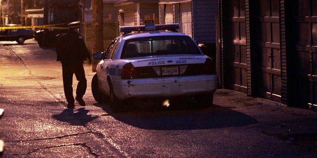 CHICAGO - MARCH 10: Chicago Police secure the area around a residence on the city's northwest side believed to be the home of suspected murderer Bart Ross March 10, 2005 in Chicago, Illinois. A note claiming responsibility for the February 28 murders of Michael Lefkow and Donna Humphrey, the husband and mother of United States District Judge Joan Lefkow was found in Ross? car following his suicide after police stopped his car last night in Wisconsin. White supremacist Matt Hale, leader of the World Church of the Creator, who is in prison for soliciting the murder of Judge Lefkow after she ruled against him in a case of trademark infringement had been considered an important link to killings. (Photo by Scott Olson/Getty Images)