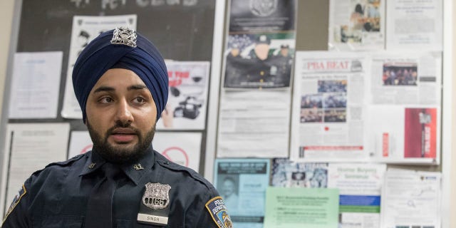 In this Tuesday, Jan. 24, 2017 photo, New York City police officer Mandeep Singh speaks during an interview with The Associated Press at the 41st Precinct in the Bronx borough of New York.